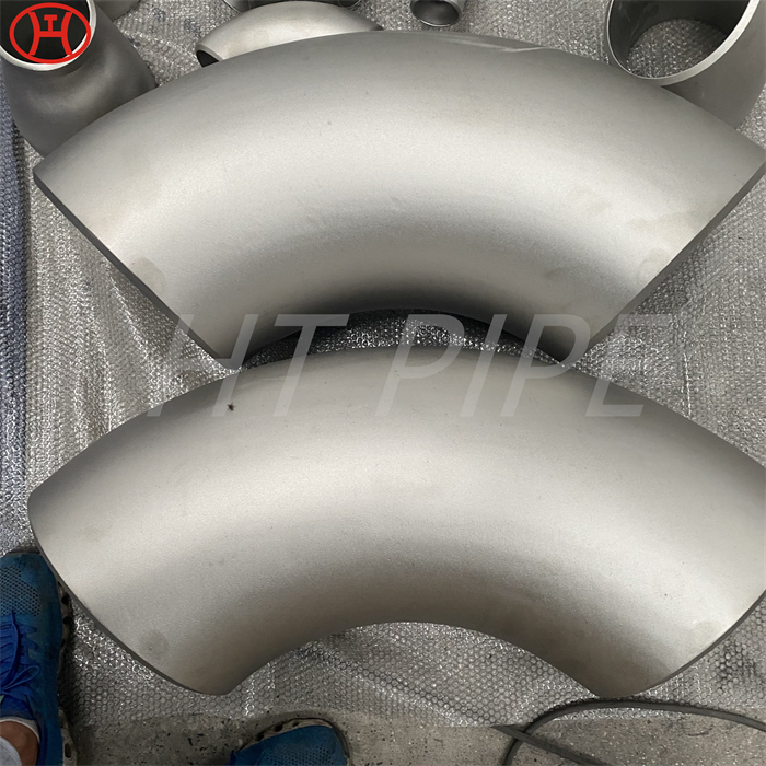 Inconel 600 elbows welded to a weld neck flange and connected to equipment